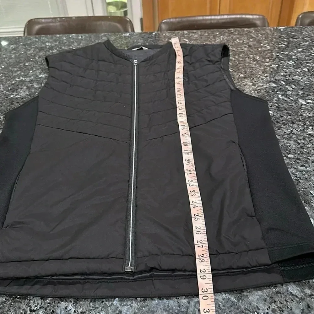 The North Face black puffer vest full front zip, pockets, front and back logo
